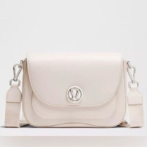 NWT - Leather Alternative Crossbody Bag 1.5L in the color cashew